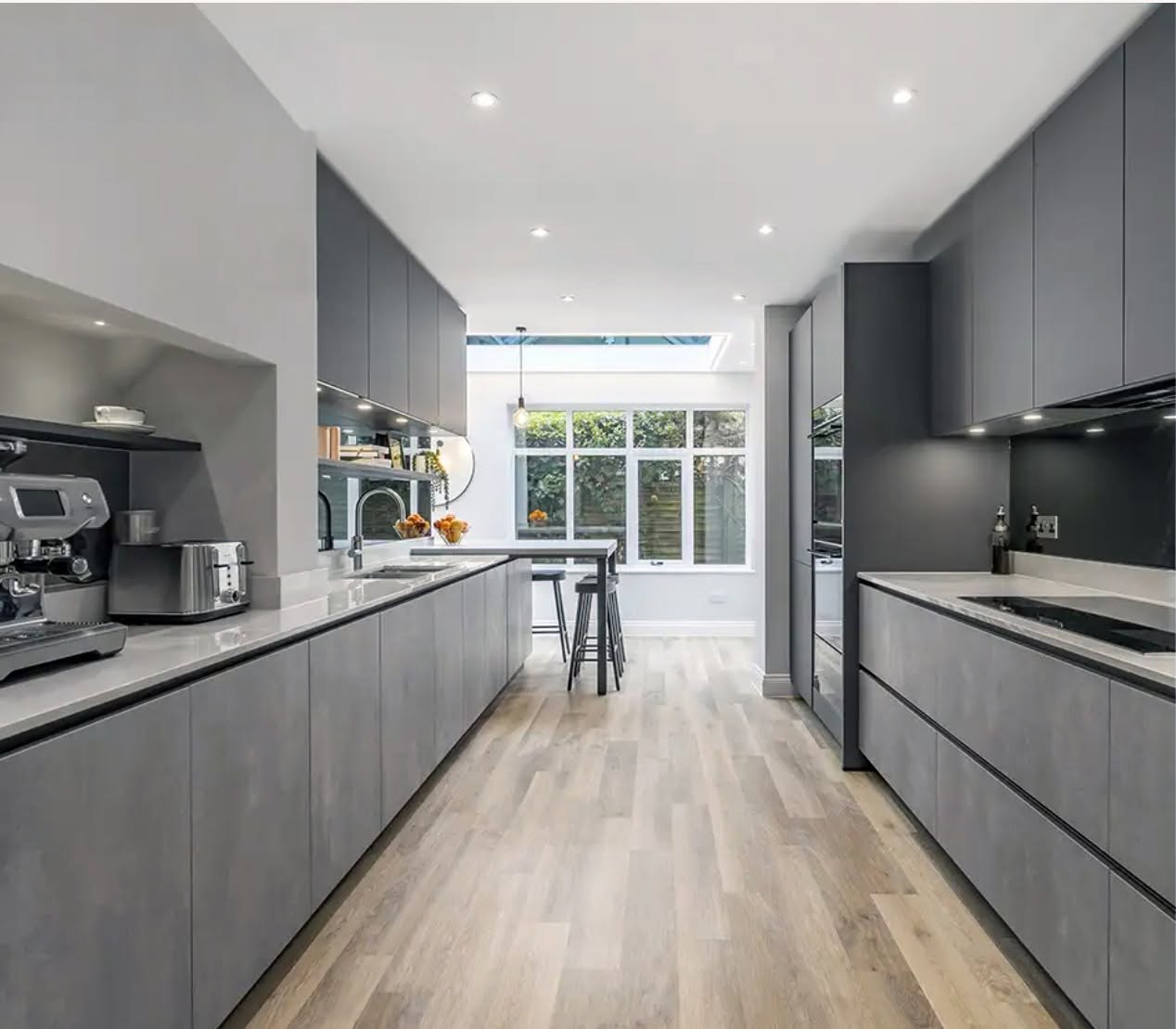 Completed grey galley kitchen